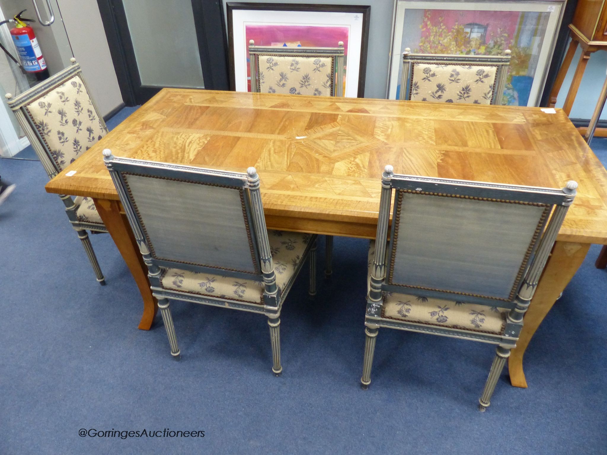 Five French painted dining chairs, with upholstered seats and backs.